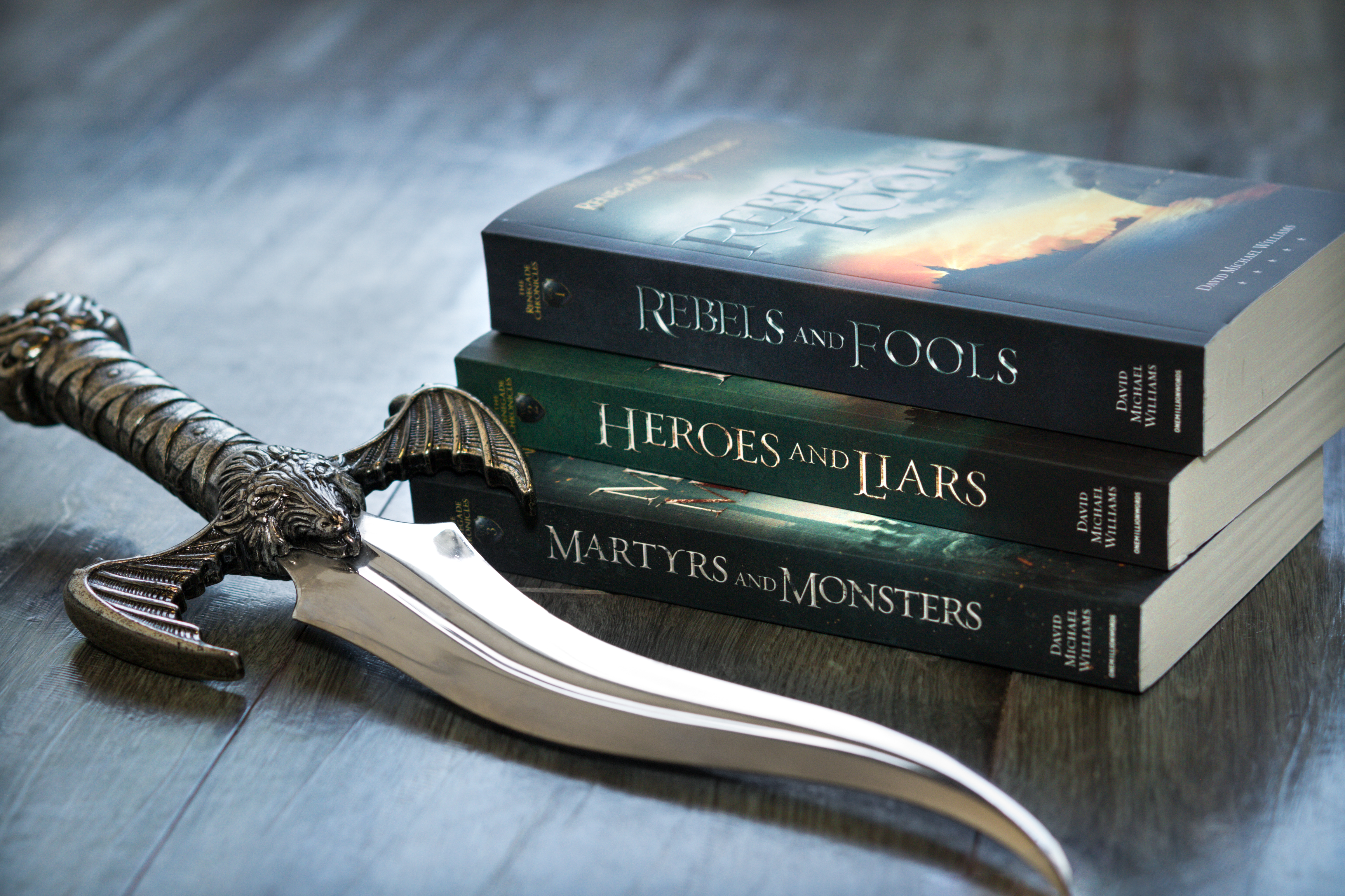 three Renegade Chronicles books stacked